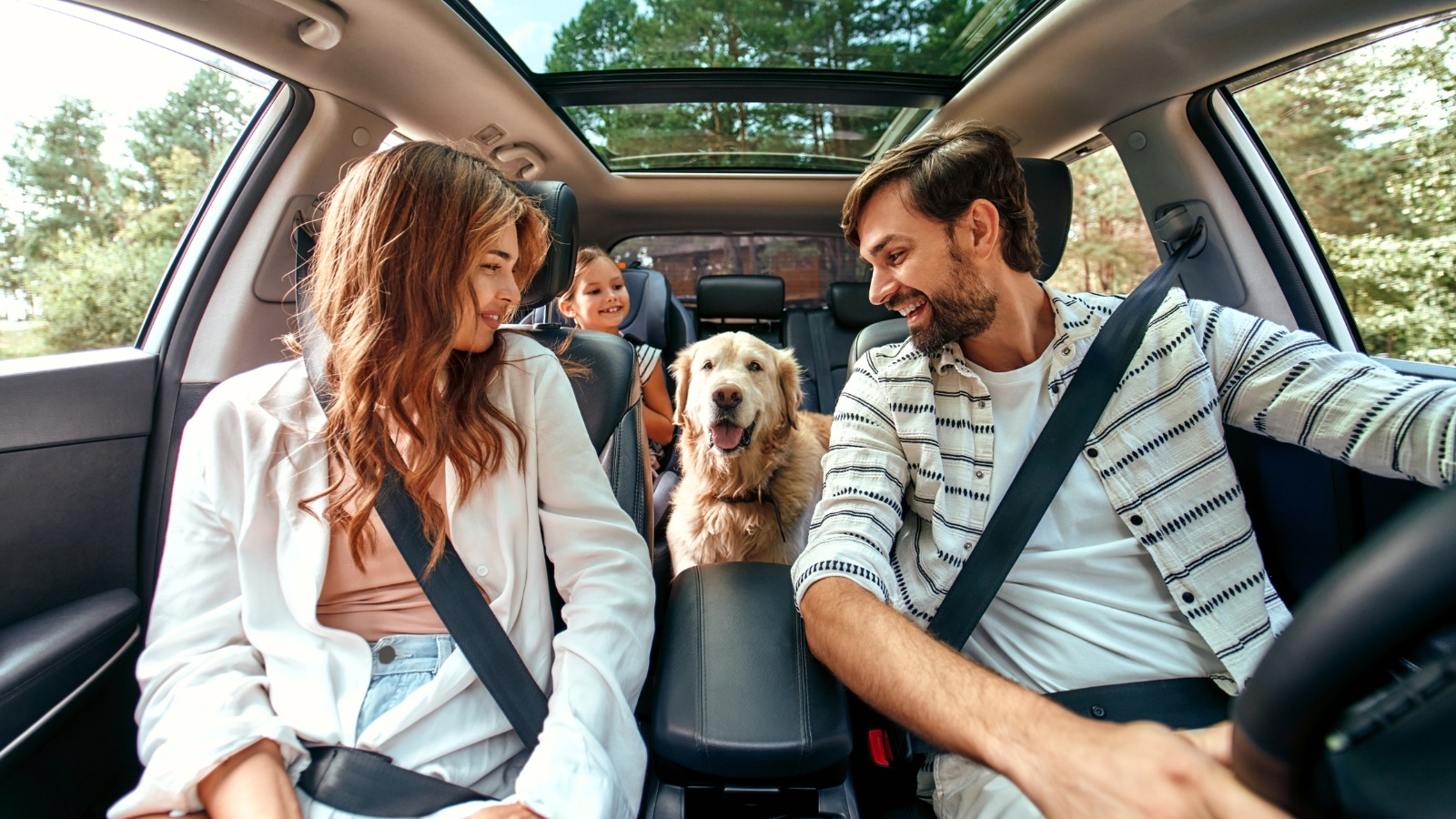 Family in the car Happy family traveling